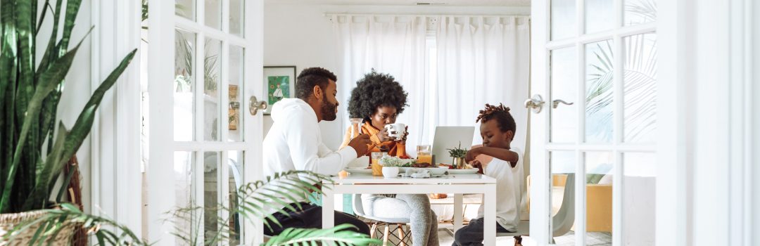 family eating at dining table